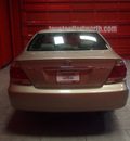 toyota camry 2005 tan sedan le gasoline 4 cylinders front wheel drive automatic with overdrive 76116