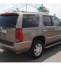 cadillac escalade 2007 gold suv gasoline 8 cylinders all whee drive automatic 78539