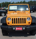 jeep wrangler unlimited 2013 orange suv sport gasoline 6 cylinders 4 wheel drive manual 77388