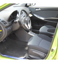 hyundai accent 2013 lt  green hatchback gs gasoline 4 cylinders front wheel drive autostick 77065