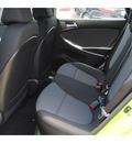 hyundai accent 2013 lt  green hatchback gs gasoline 4 cylinders front wheel drive autostick 77065