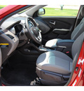 hyundai tucson 2013 garnet red suv gl gasoline 4 cylinders front wheel drive autostick 77065