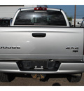 dodge ram 1500 2004 silver gasoline 8 cylinders 4 wheel drive automatic with overdrive 77590