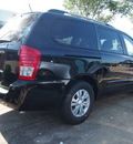 kia sedona 2012 black van lx gasoline 6 cylinders front wheel drive 6 speed automatic 77034