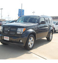 dodge nitro 2011 dk  gray suv sxt gasoline 6 cylinders 2 wheel drive automatic with overdrive 77656