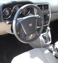 dodge caliber 2010 silver hatchback sxt gasoline 4 cylinders front wheel drive automatic 79925
