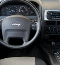 jeep grand cherokee 2004 dk  blue suv laredo columbia ed  gasoline 6 cylinders 4 wheel drive automatic 62034