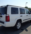 jeep commander 2006 white suv gasoline 6 cylinders 4 wheel drive automatic 99352