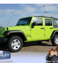 jeep wrangler unlimited 2012 green suv sport gasoline 6 cylinders 4 wheel drive 6 speed manual 76645