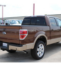ford f 150 2012 brown lariat gasoline 6 cylinders 4 wheel drive automatic 76567