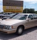 cadillac deville 1998 beige sedan gasoline v8 front wheel drive automatic 77531
