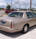 cadillac deville 1998 beige sedan gasoline v8 front wheel drive automatic 77531