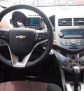 chevrolet sonic 2012 black sedan lt gasoline 4 cylinders front wheel drive shiftable automatic 77566