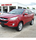 hyundai tucson 2012 dk  red limited gasoline 4 cylinders front wheel drive automatic with overdrive 77627