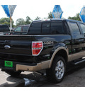 ford f 150 2012 black lariat gasoline 6 cylinders 4 wheel drive automatic with overdrive 77531