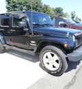 jeep wrangler unlimited 2009 black suv sahara gasoline 6 cylinders 4 wheel drive automatic 13502
