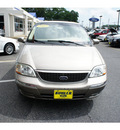 ford windstar 2002 gold van limited gasoline 6 cylinders front wheel drive automatic with overdrive 07724