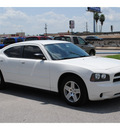 dodge charger 2007 white sedan gasoline 6 cylinders rear wheel drive automatic 77037