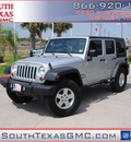 jeep wrangler unlimited 2010 silver suv sport gasoline 6 cylinders 4 wheel drive automatic 78502