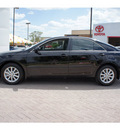 toyota camry 2011 black sedan xle v6 gasoline 6 cylinders front wheel drive automatic 78006
