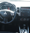 mitsubishi outlander 2010 white suv es gasoline 4 cylinders front wheel drive autostick 77065
