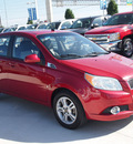 chevrolet aveo 2009 red hatchback aveo5 lt gasoline 4 cylinders front wheel drive automatic 77304