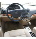 chevrolet aveo 2007 orange sedan ls gasoline 4 cylinders front wheel drive automatic 76543