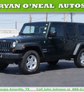 jeep wrangler unlimited 2010 green suv sport gasoline 6 cylinders 4 wheel drive automatic 79110