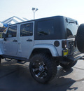 jeep wrangler unlimited 2009 silver suv sahara gasoline 6 cylinders 4 wheel drive automatic with overdrive 07730