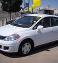 nissan versa 2011 white hatchback gasoline 4 cylinders front wheel drive automatic 79925