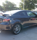 scion tc 2009 dk  gray coupe gasoline 4 cylinders front wheel drive 5 speed manual 76011