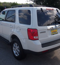 mazda tribute 2009 off white suv i grand touring gasoline 4 cylinders front wheel drive automatic 77802