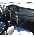 mini cooper 2006 black hatchback s gasoline 4 cylinders front wheel drive 6 speed manual 78233