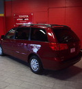 toyota sienna 2010 dk  red van le 7 passenger gasoline 6 cylinders front wheel drive automatic 76116