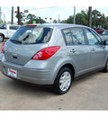 nissan versa 2011 silver hatchback 1 8 s gasoline 4 cylinders front wheel drive automatic with overdrive 77657