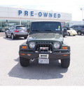 jeep wrangler 2006 green suv unlimited gasoline 6 cylinders 4 wheel drive automatic 77074
