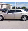 chrysler 300 2006 gold sedan c gasoline 8 cylinders all whee drive automatic 77074