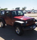 jeep wrangler 2009 red suv x gasoline 6 cylinders 4 wheel drive automatic 76049
