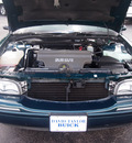 buick lesabre 1999 dark green sedan limited gasoline v6 front wheel drive automatic 77074