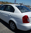 hyundai accent 2009 white sedan gls gasoline 4 cylinders front wheel drive automatic 94010