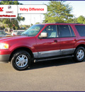 ford expedition 2004 red suv xlt gasoline 8 cylinders 4 wheel drive automatic with overdrive 55124