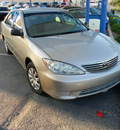 toyota camry 2005 gold sedan gasoline 4 cylinders front wheel drive automatic 79936