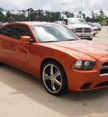 dodge charger 2011 orange sedan se gasoline 6 cylinders rear wheel drive automatic 77656