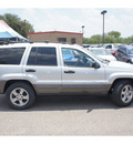 jeep grand cherokee 2004 silver suv freedom edition gasoline 8 cylinders 4 wheel drive automatic 78539