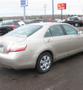 toyota camry 2009 tan sedan le gasoline 4 cylinders front wheel drive automatic 55811