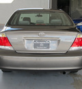 toyota camry 2005 gray sedan standard gasoline 4 cylinders front wheel drive automatic with overdrive 77477