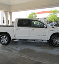 nissan titan 2011 white sv gasoline 8 cylinders 2 wheel drive automatic with overdrive 77477