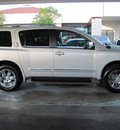 nissan armada 2011 silver suv platinum flex fuel 8 cylinders 2 wheel drive automatic with overdrive 77477