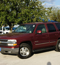 chevrolet tahoe 2002 red suv lt flex fuel 8 cylinders rear wheel drive 4 speed automatic 76210