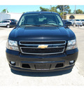 chevrolet suburban 2012 black suv lt 1500 flex fuel 8 cylinders 2 wheel drive automatic with overdrive 77627